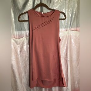 Shirt by Blooming Jelly size small abs the color is light pink.